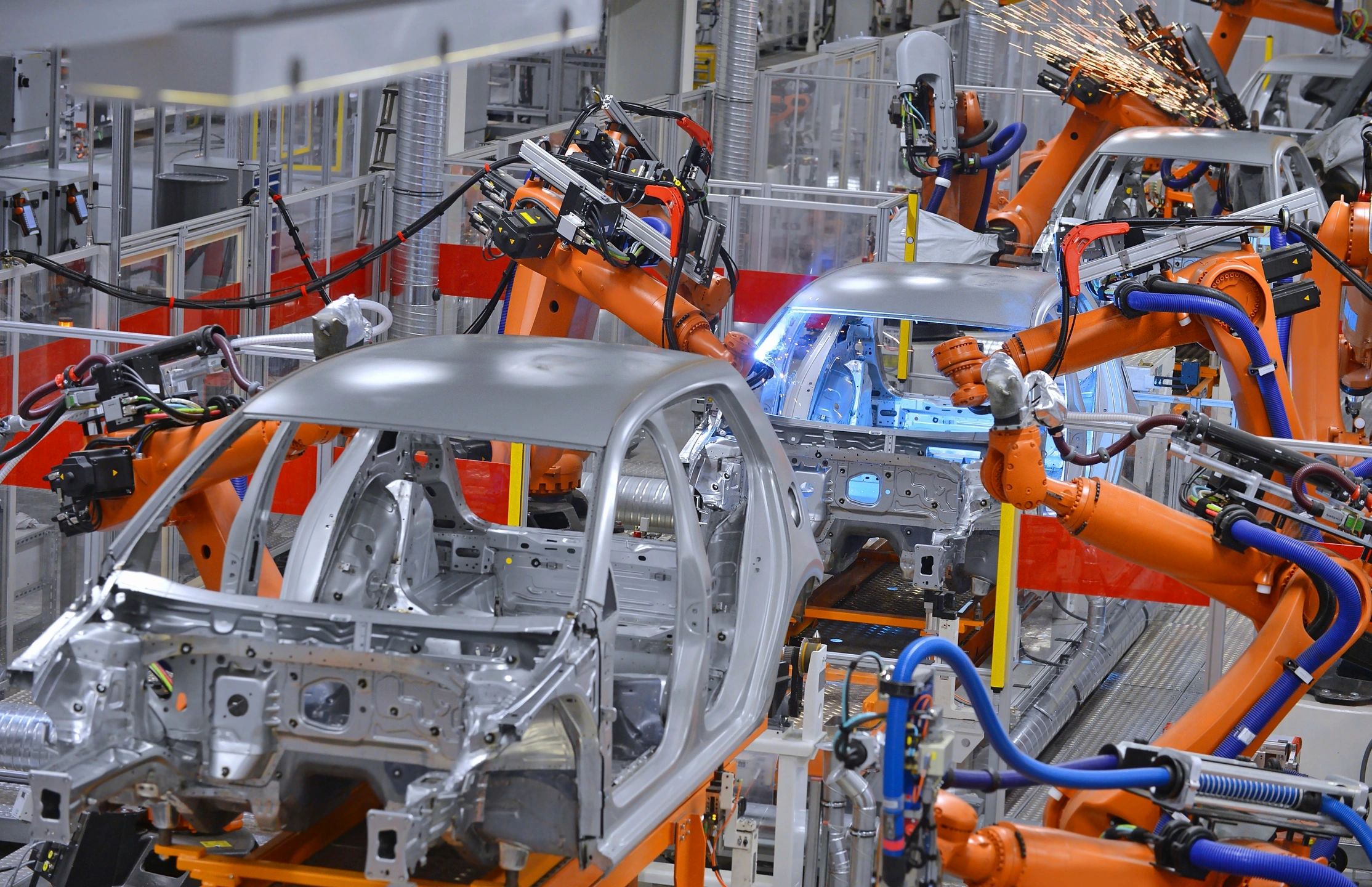 Robotic manufacturing assembly line